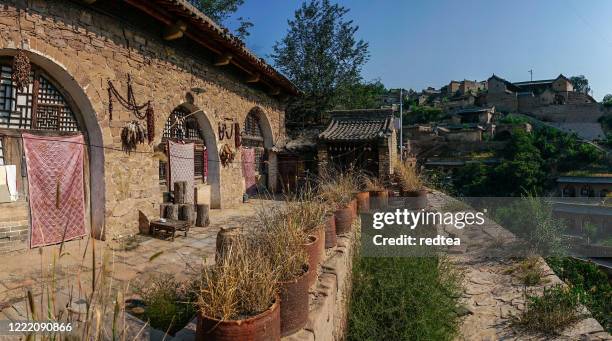 qikou ancient town，ancient village in shanxi province, china - cliff dwelling stock pictures, royalty-free photos & images