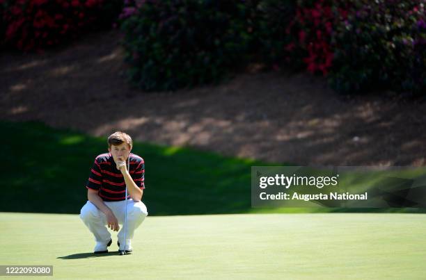 Amateur Matthew Fitzpatrick of England lines a putt on No. 13 green during the first round at Augusta National Golf Club on Thursday, April 10, 2014.