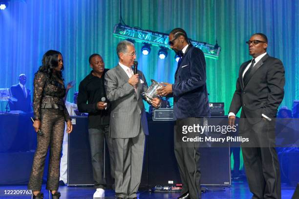 Vice President Catherine Brewton, Rapper Dr. Dre, BMI President and CEO Del Bryant, BMI 2011 Urban Awards Icon Snoop Dogg and guest speak onstage...