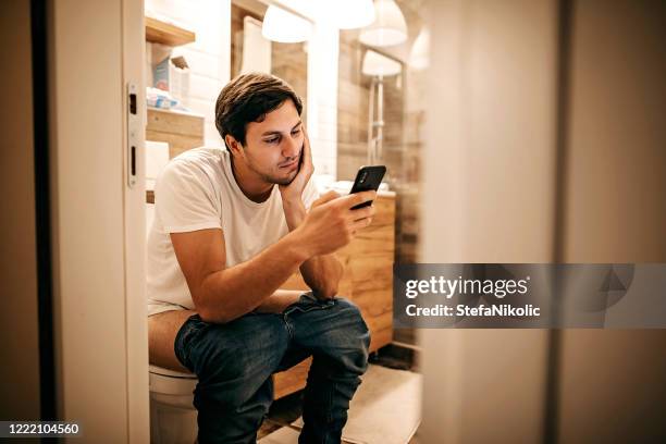 morning routune - lady sitting on the toilet stock pictures, royalty-free photos & images