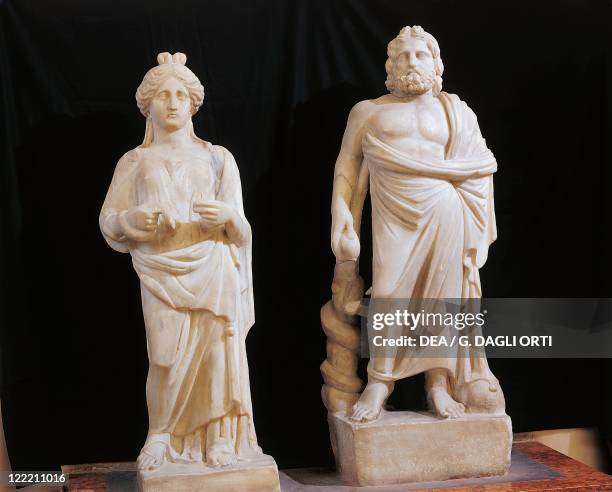 Roman civilization. Marble statue of Asclepius, the god of medicine, and his daughter Hygieia, goddess of health. From Mohamara Sidi-Bishr.