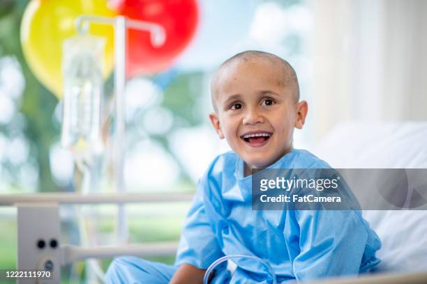 little boy with cancer in the hospital - fighting cancer stock pictures, royalty-free photos & images
