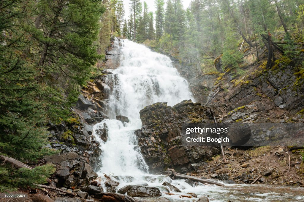 Morrell Falls Flowing on Wet Rainy Day in Montana USA