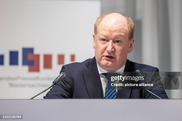 June 2020, Lower Saxony, Hanover: Reinhold Hilbers , Finance Minister of Lower Saxony, speaks at a cabinet press conference of the Lower Saxony state...