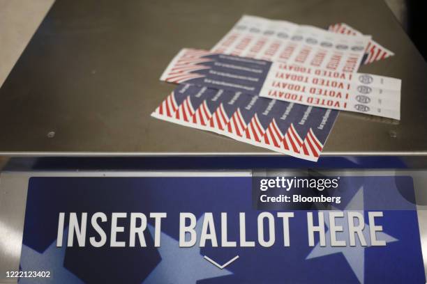 An absentee ballot box stands at a polling location in Louisville, Kentucky, U.S., on Tuesday, June 23, 2020. Voters face the possibility of long...