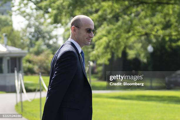 Stephen Miller, White House senior advisor for policy, walks on the South Lawn of the White House before boarding Marine One in Washington, D.C.,...