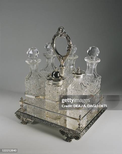 Glassware - England - 20th century. Cruet. Six crystal bottles and Sheffield plate.