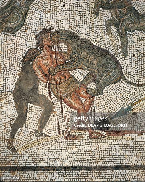 Tunisia, El Djem, Mosaic work depicting a man killed by wild beasts.