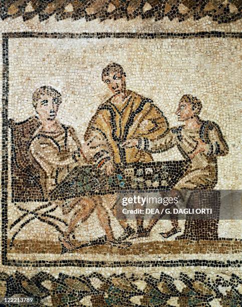 Roman civilization, 3rd century A.D. Mosaic depicting dice players. From Thysdrus .