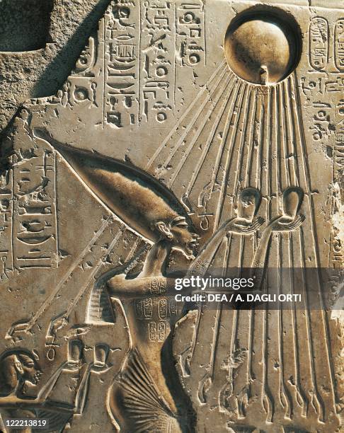 Egypt, Tell el-Amarna, Bas-relief depicting Amenhotep IV while worshiping the solar disc, eighteenth dynasty, New Kingdom, limestone .