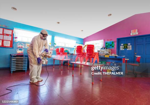 preparing a daycare facility for returning to classes - disinfection school stock pictures, royalty-free photos & images