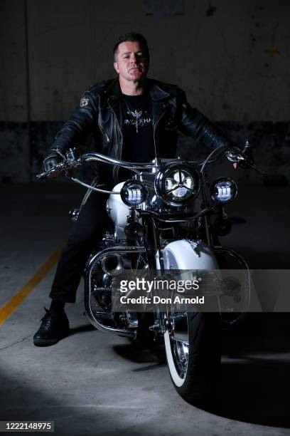 Renowned pastry chef Vincent Gadan poses on his Harley Davidson motorcycle in the garage of his inner-city apartment on May 01, 2020 in Sydney,...