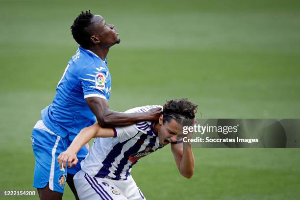 Dakonam Djene of Getafe, Enes Unal of Real Valladolid during the La Liga Santander match between Real Valladolid v Getafe at the José Zorrilla...