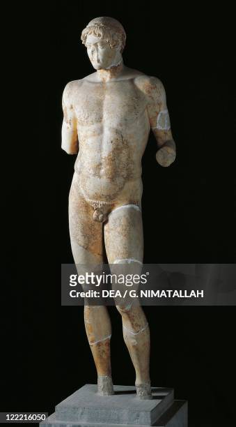 Greek civilization, 5th century b.C. Omphalos Apollo statue. Roman copy.