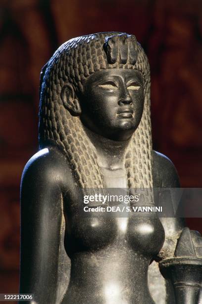 Egyptian civilization, Ptolemaic Period, 1st century b.C. Basalt statue of of Cleopatra VII horn of plenty . Detail.