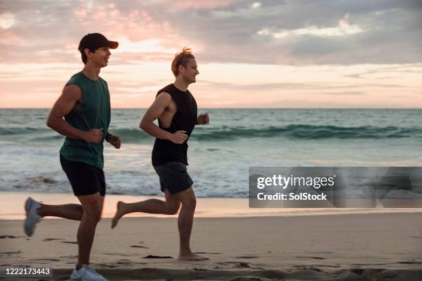 we can do this - young man jogging stock pictures, royalty-free photos & images