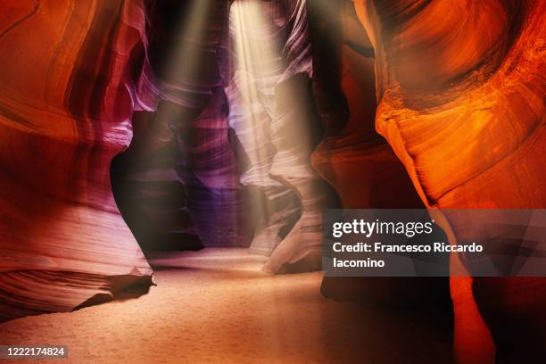 upper antelope slot canyon near page, arizona. light beams. usa - antelope canyon stock pictures, royalty-free photos & images