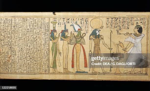 Egyptian civilization, Third Intermediate Period. Papyrus of Khonsumes. The Book of the Dead. The deceased making offerings to Osiris, Isis and...