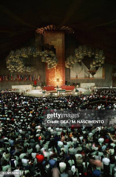 Mexico - Mexico City - Basilica of Nuestra Señora de Guadalupe . Interior, celebration of Mass.