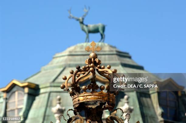 Italy, Piedmont Region, Stupinigi, entrance gate with House of Savoy coat of arms at Royal hunting lodge.