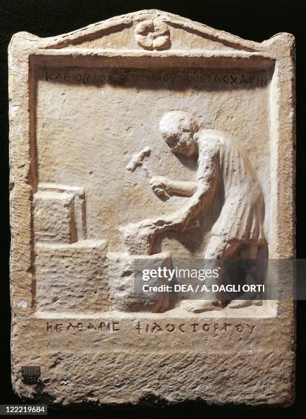 Roman civilization. Funerary stele of a blacksmith.