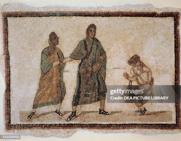 Roman civilization, 3rd century A.D. Detail of mosaic depicting a scene of a comedy : a slave chained by his master, who receives a messenger. From...