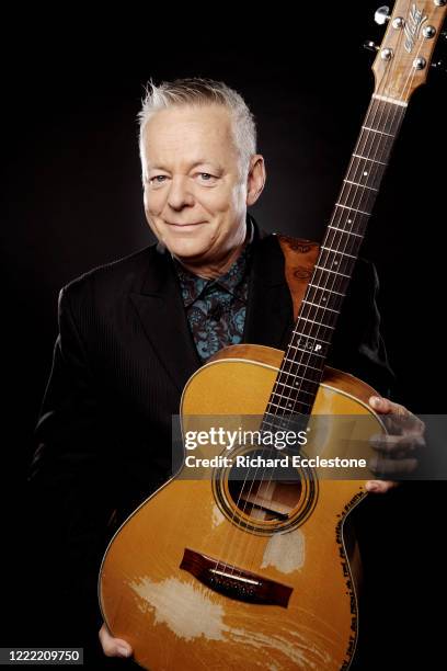 Tommy Emmanuel, Australian guitarist, United Kingdom, 2014. He is known for his complex fingerstyle technique, energetic performances and the use of...