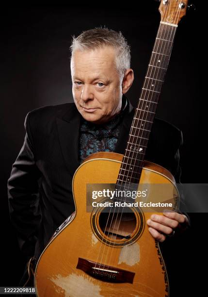 Tommy Emmanuel, Australian guitarist, United Kingdom, 2014. He is known for his complex fingerstyle technique, energetic performances and the use of...