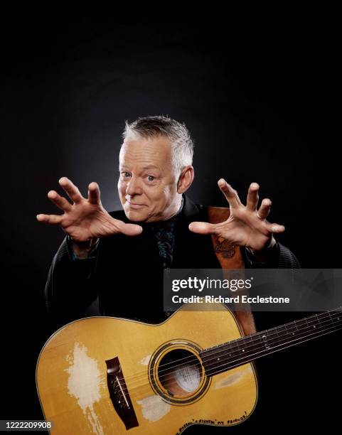 Tommy Emmanuel, Australian guitarist, United Kingdom, 2014. He is known for his complex fingerstyle technique, energetic performances and the use of...