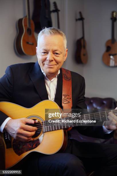 Tommy Emmanuel, Australian guitarist, United Kingdom, 2014. He is known for his complex fingerstyle technique, energetic performances and the use of...