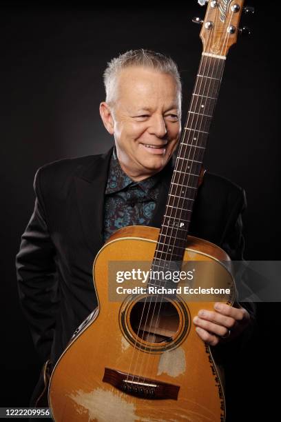 Tommy Emmanuel, Australian guitarist, United Kingdom, 2014. He is known for his complex fingerstyle technique, energetic performances and the use of...