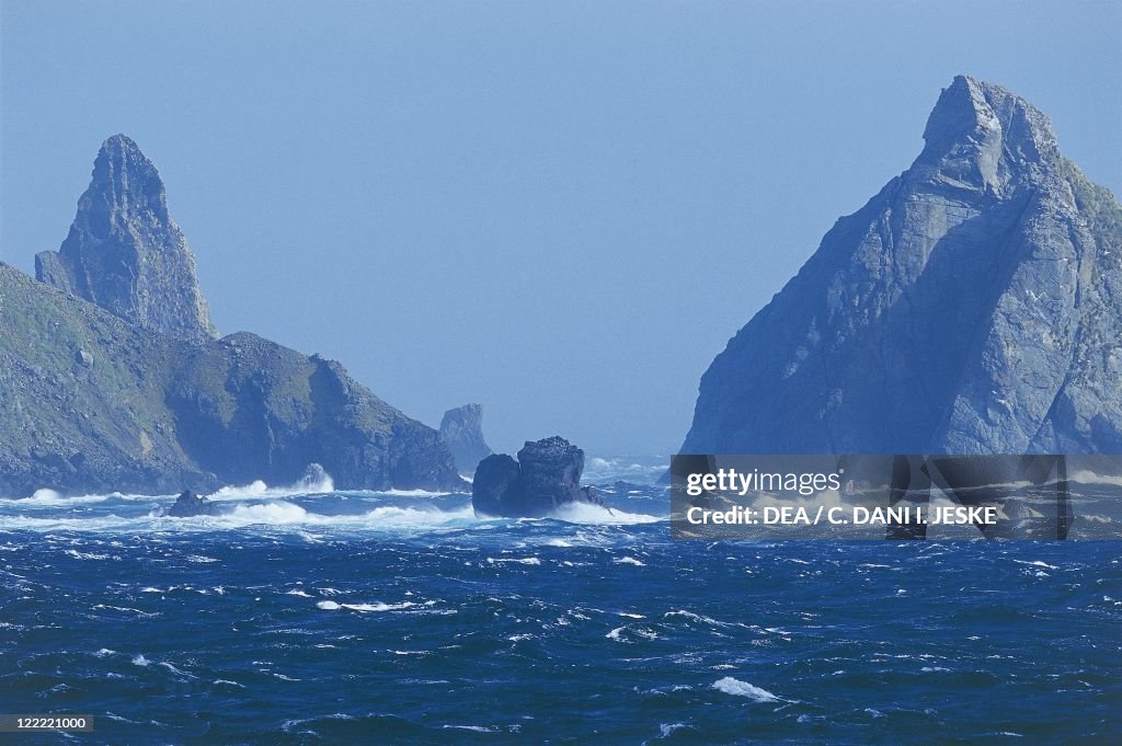 Rock formations in the sea, Cape Horn, Magallanes Y Antartica Chilena Region, Chile