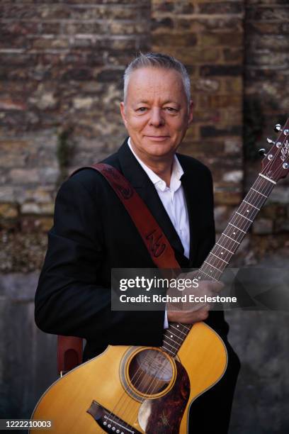 Tommy Emmanuel, Australian guitarist, United Kingdom, 2014. He is known for his complex fingerstyle technique, energetic performances and the use of...