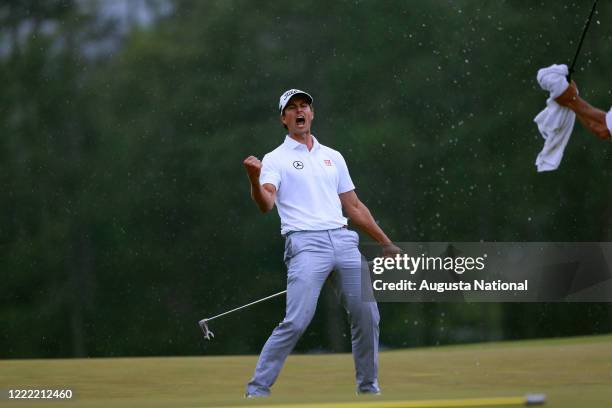 Adam Scott of Australia putts for birdie on No. 18 during Round 4 of the 2013 Masters.