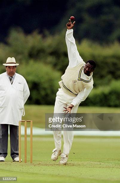 Roger Harper the former West Indies player bowls during the Allsport Cricket Match at Wormsley in England. \ Mandatory Credit: Clive Mason /Allsport