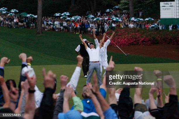Adam Scott of Australia celebrates his winning putt on a playoff at No. 10 during Round 4 of the 2013 Masters.