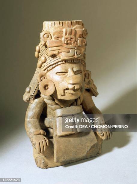 Urn depicting Cocijo the God of rain, terracotta.
