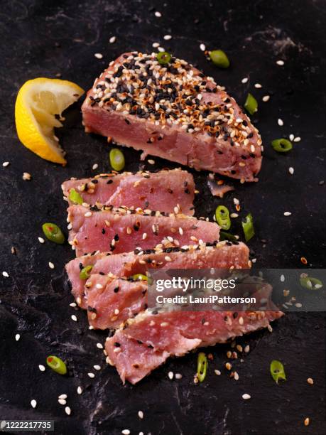 sesame crusted, seared tuna fillet - sesame stock pictures, royalty-free photos & images
