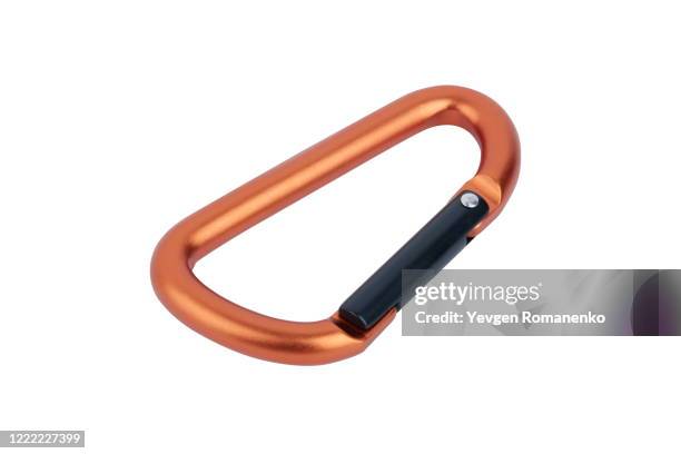 orange carabiner isolated on white background - carabina fotografías e imágenes de stock