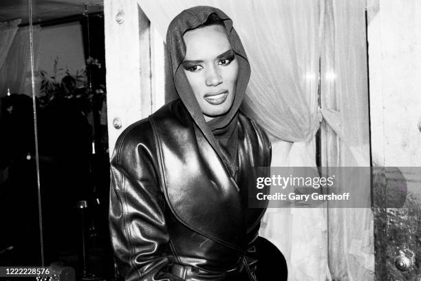 Portrait of Jamaican-born Disco singer, model, and actress Grace Jones as she poses backstage at the Tunnel nightclub, New York, New York, February...