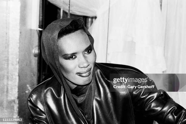 Portrait of Jamaican-born Disco singer, model, and actress Grace Jones as she poses backstage at the Tunnel nightclub, New York, New York, February...