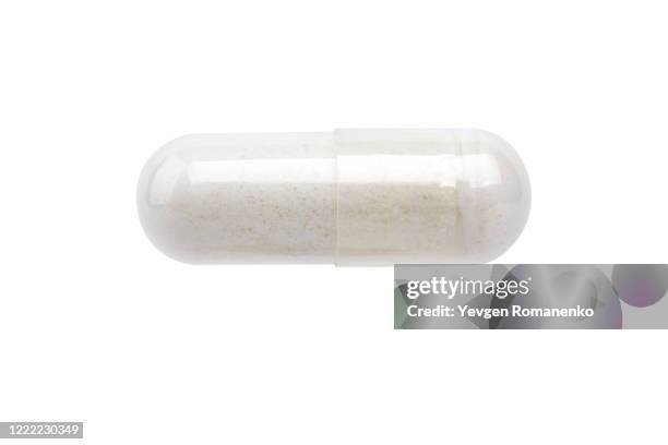 white pill isolated on white background - pill stock pictures, royalty-free photos & images