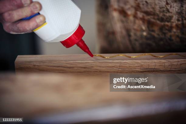 carpenter glues wood - glue stock pictures, royalty-free photos & images