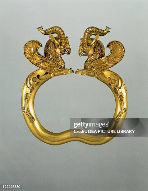 Persian civilization, Achaemenid Period, 5th-4th century b.C. Goldsmithery. Oxus treasure. Solid gold bracelet adorned by winged griffins.