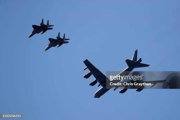 Two B-52 Bombers and two F-15 fighter jets fly over the University Medical Center on May 01, 2020 in New Orleans, Louisiana. The flyover was done as...