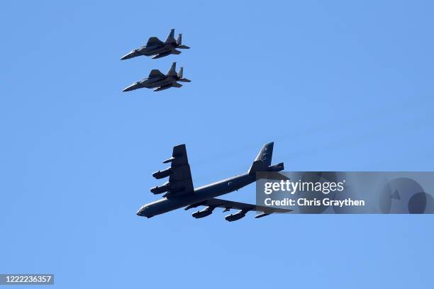 Two B-52 Bombers and two F-15 fighter jets fly over the University Medical Center on May 01, 2020 in New Orleans, Louisiana. The flyover was done as...