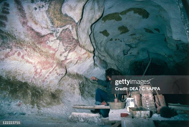 France - Aquitaine - Decorated Caves of the Vezere Valley . Lascaux Cave, restoration intervention on upper Paleolithic cave painting.