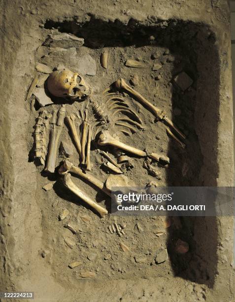 Anthropology - Reconstruction of a burial of Neanderthal Man at La Chapelle-aux-Saints, France.