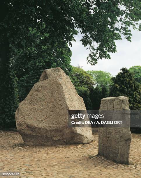 Denmark - Jelling Hills, runestones . Runic inscriptions on stones, the smaller one was raised by King Gorm in 965 in memory of his wife Queen Thyra;...