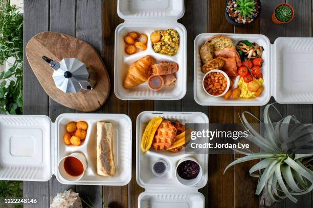 breakfast in a paper to-go box. - breakfast to go stock pictures, royalty-free photos & images